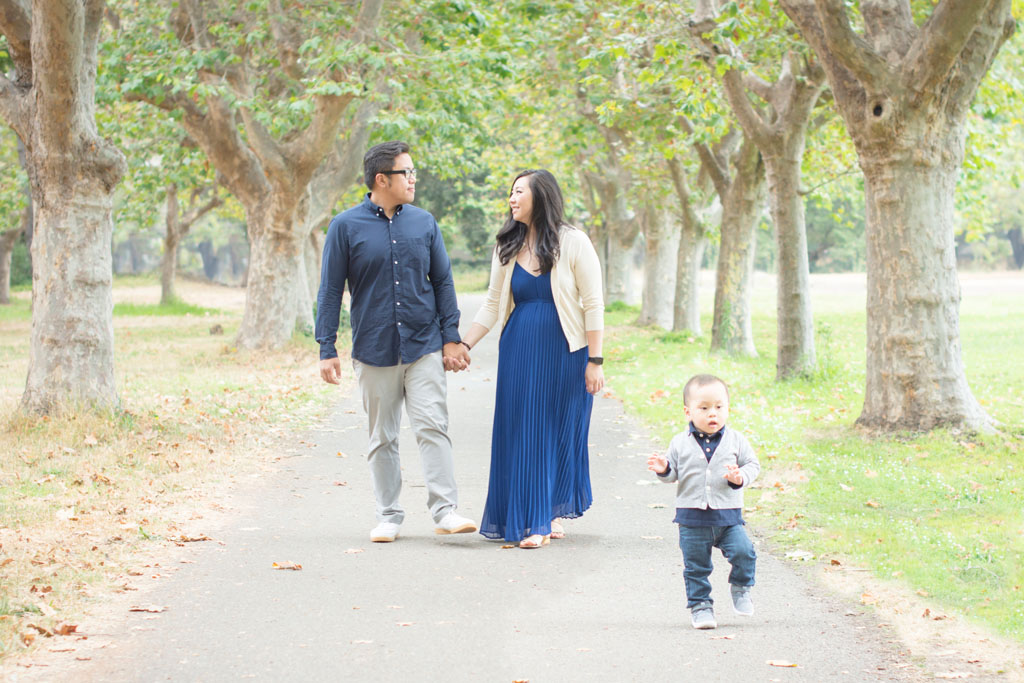 Family photos down the tree-lined path at Crab Cove in Alameda by Oakland photographer Jackie Rutan.